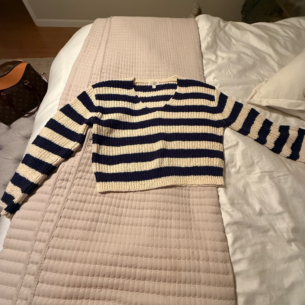 J. Crew navy blue and Cream V-Neck Sweater. Wore once. Great condition.